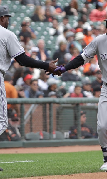 Dahl hits grand slam, drives in 5 as Rockies beat Giants